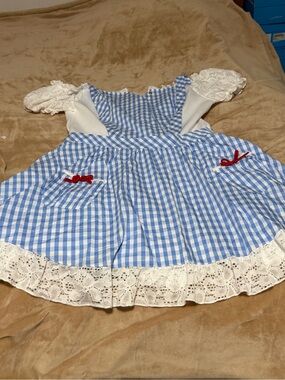 Wizard of Oz Dorothy Blue Gingham Dress with White Lace and Red Bows Women’s Lge